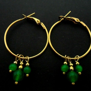 A pair of gold colour 30mm 1&quot; hoop and green jade bead earrings.