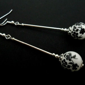A pair of pretty porcelain flower  bead  long  dangly earrings.