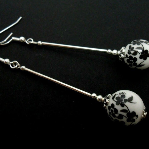 A pair of pretty porcelain flower  bead  long  dangly earrings.