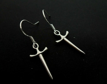 A pair of tibetan silver  dagger/knife themed dangly earrings.