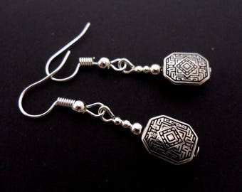 A pair of cute tibetan silver dangly earrings.