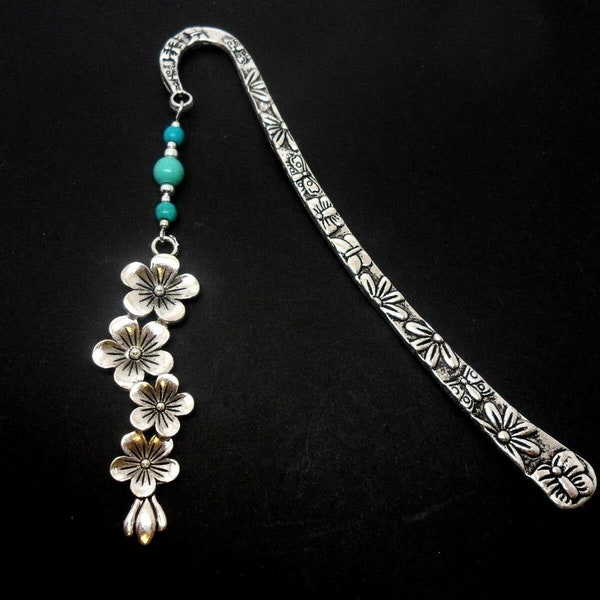 A hand made tibetan silver & turquoise bead flower themed bookmark. New.