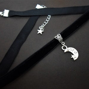 A ladies/girls black velvet 10mm (half inch) choker moon star charm necklace.