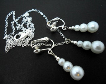 A hand made white glass pearl  necklace and  clip on earring set.