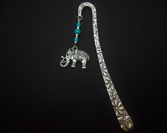 A pretty tibetan silver elephant themed bookmark with turquoise beads.