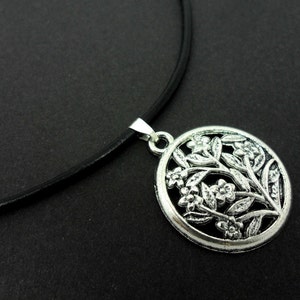 A leather cord 13&quot; - 14&quot; tibetan silver circle flower charm choker necklace.