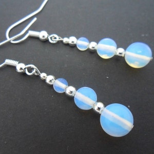 A pair of pretty dangly opalite  bead  dangly earrings.