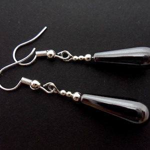 A pair of pretty hand made hematite teardrop   dangly earrings. new.