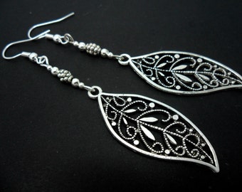 A pair of pretty tibetan silver leaf long dangly earrings.