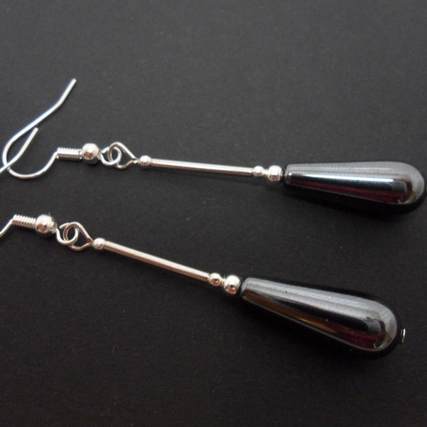 A pair of pretty hand made hematite teardrop   dangly earrings. new.