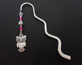 A tibetan silver owl and pink crystal bead bookmark. 9cm long.