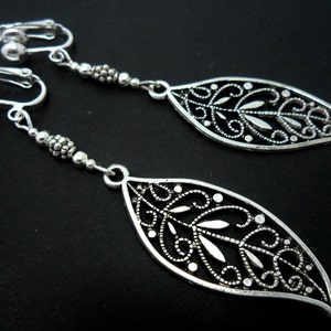 A pair of pretty tibetan silver leaf dangly clip on  earrings.