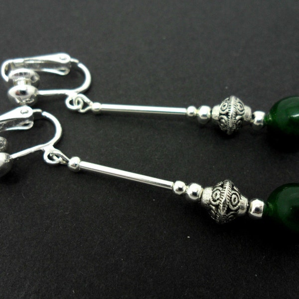 A pair of pretty dark green jade  bead  dangly clip on earrings.