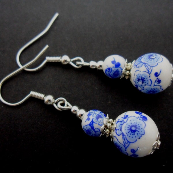 A pair of pretty porcelain flower  bead   dangly earrings.