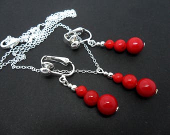 A hand made red coral or white jade bead necklace and clip on earring set.