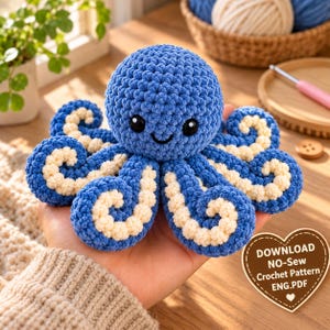 May include: A blue and cream crochet octopus plush toy with a round head, black safety eyes, and a stitched smile. The tentacles feature a cream-colored underside. A heart-shaped graphic includes the text: DOWNLOAD NO-Sew Crochet Pattern ENG.PDF.