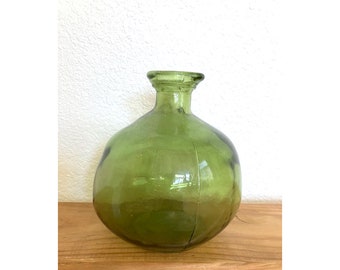 Green glass bottle vase