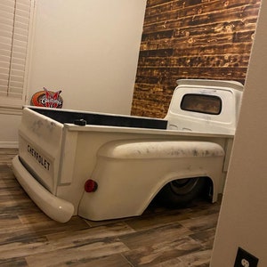 Full size bed.  Car furniture.   Kids car truck bed.  Mancave.