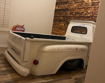 Full size bed.  Car furniture.   Kids car truck bed.  Mancave.