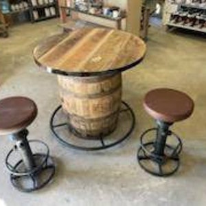 Whiskey barrel table with stools