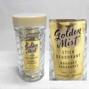 May include: A white ceramic mug with a black handle and the text "But First, Coffee" in a bold, black font. The mug is sitting on a wooden surface. The mug is approximately 4 inches tall.