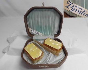 Antique Yellow Celluloid Pyralin Mayflower 2 Brushes & Comb Dresser Set in Box