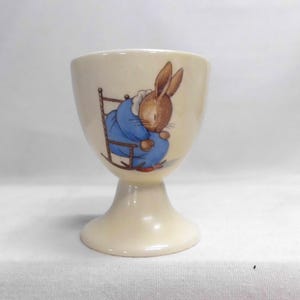 May include: A rustic wooden sign with the text "Welcome to our home" in a handwritten style. The sign features a distressed finish and a simple, inviting design, perfect for a front porch or entryway.