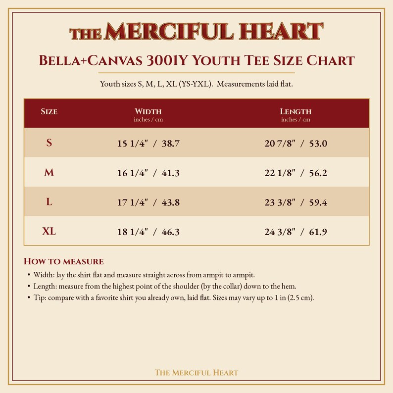 Op de afbeelding: Een maattabel voor het Bella+Canvas 3001Y jeugd-T-shirt van The Merciful Heart. De tabel toont de maten S, M, L en XL met bijbehorende breedte- en lengtematen in inches en centimeters, inclusief instructies voor het opmeten.