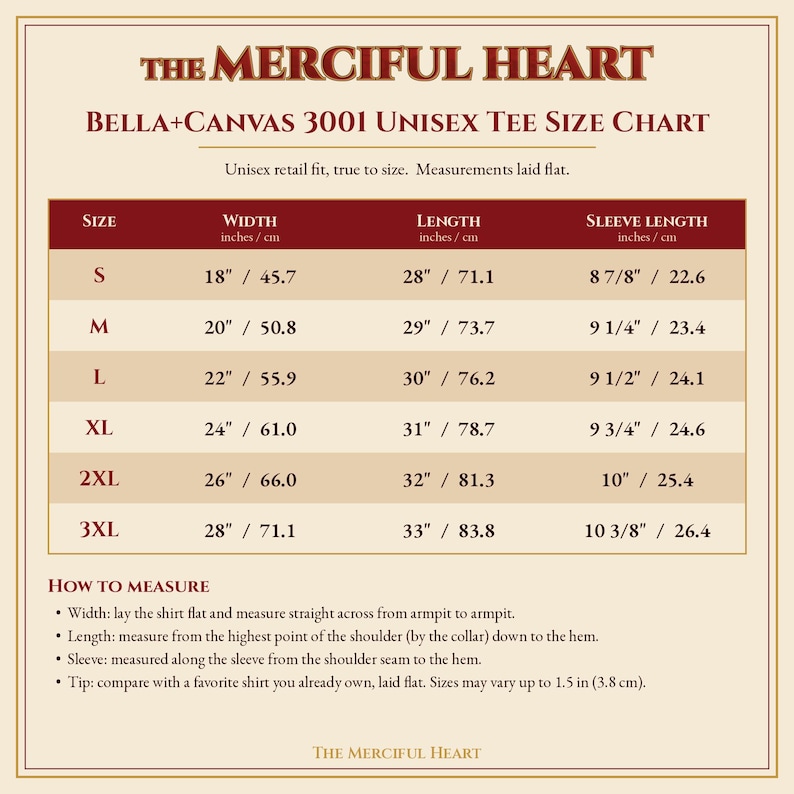 May include: The Merciful Heart Bella+Canvas 3001 unisex tee size chart displays measurements in inches for sizes S through 3XL. It includes width, length, and sleeve length columns, along with instructions on how to measure a shirt laid flat.