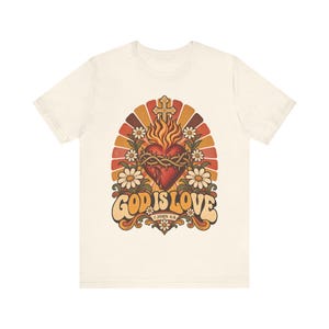 1 John 4:8 Shirt | Catholic T-Shirt | Faith Gift for Women | God Is Love, Retro Sacred Heart Sunburst immagine 2
