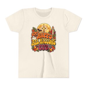 Kinder T-shirt met katholieke Halloween-opdruk, retro en groovy Halloween-shirt, pompoen met kruis en maan. afbeelding 3
