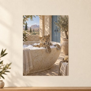 May include: A leopard with spotted fur rests inside a large, round, beige stone bathtub filled with white foam. A beige towel hangs over the side of the tub, which is situated on a stone patio near a blue door and a potted olive tree.