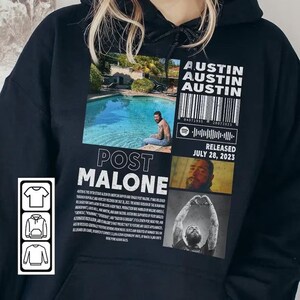 Puede incluir: Sudadera con capucha negra con un dise&ntilde;o gr&aacute;fico con el texto "AUSTIN" y "POST MALONE". El dise&ntilde;o incluye im&aacute;genes de una piscina, una persona y un c&oacute;digo de barras. La sudadera tambi&eacute;n tiene el texto "RELEASED JULY 28, 2023".