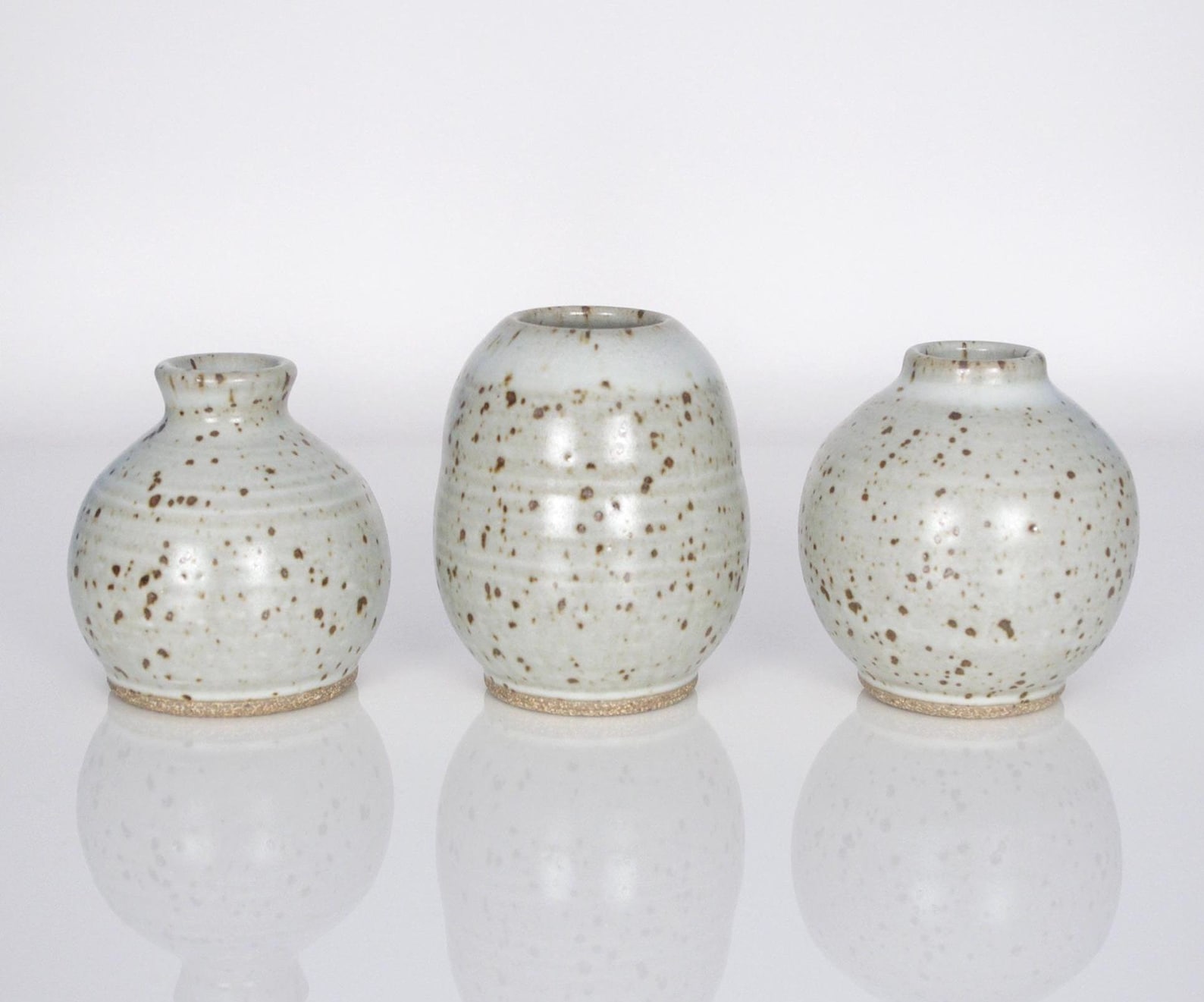 Speckled stoneware bud vase for a cowgirl coastal kitchen