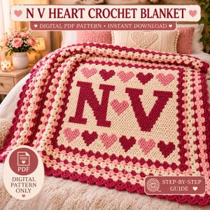 May include: A crochet blanket featuring the letters N and V in dark red, surrounded by a pattern of light and dark pink hearts on a cream background. The blanket has a scalloped border in shades of pink and red. Text reads N V HEART CROCHET BLANKET.