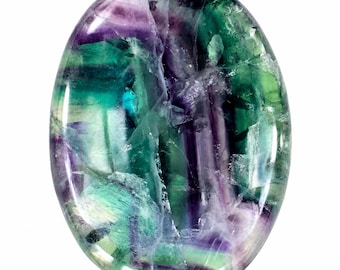 May include: An oval-shaped polished fluorite gemstone featuring a vibrant blend of deep purple and emerald green bands. The stone has a smooth, glossy surface with visible internal crystalline fractures and natural color variations throughout.