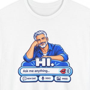May include: A white t-shirt featuring a graphic of a man with grey hair and a beard wearing a blue shirt, leaning on a chat interface. The text reads HI. Ask me anything... with icons for NEW CHAT, VOICE, and IMAGE, plus a red lip icon.