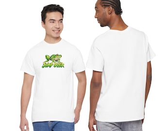 May include: A white short-sleeved t-shirt featuring a graphic of a green frog positioned above the text "JUMP OVER" in stylized green lettering. The shirt has a crew neckline and a standard fit, shown from both the front and back views.