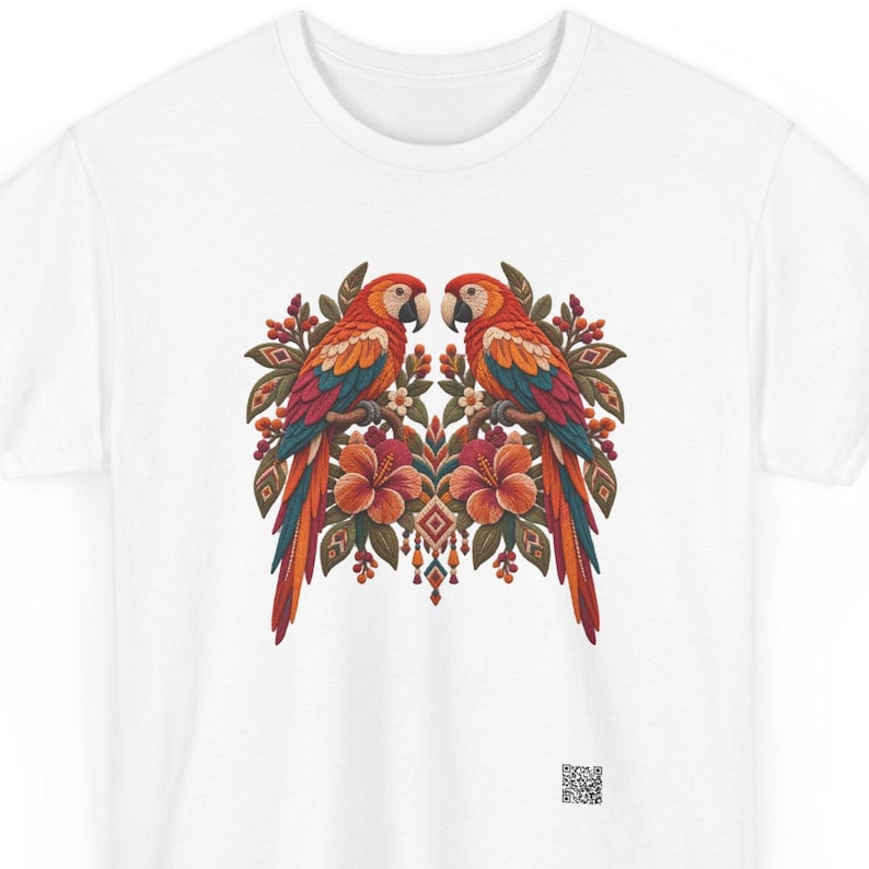 Scarlet macaw shirt, Pair of scarlet macaws above hibiscus flowers in folk art style, front print of the t-shirt.