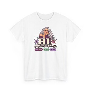 May include: A white t-shirt featuring a graphic of a person with long wavy gray hair and glasses. The text reads AI HI Ask me anything, with icons for new chat, voice, and image. The design includes a speech bubble with lips.