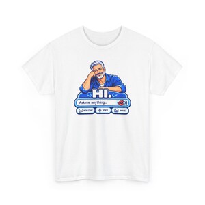 May include: A white t-shirt featuring a graphic of a man with grey hair and a beard wearing a blue shirt, leaning on a chat interface. The text reads HI. Ask me anything... with icons for new chat, voice, and image, plus a red lip icon.