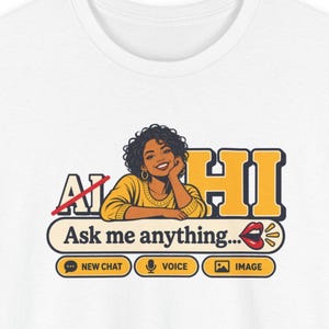 May include: A white t-shirt featuring a graphic of a person with curly hair wearing a yellow sweater. The text reads AI HI with a red line through AI, followed by Ask me anything... and buttons labeled NEW CHAT, VOICE, and IMAGE.