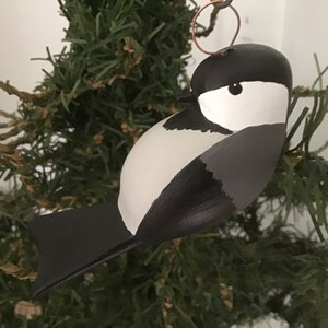 Feeding Chickadee ornament: Hand Carved and Hand Painted by me at my shop in Maine