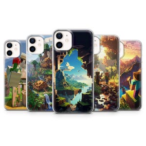 May include: Five clear phone cases arranged in a row, each featuring a different colourful, blocky, pixelated landscape design inspired by a video game. The designs include a stone creature, a mountain village, a cliffside view, a forest, and a sunset.