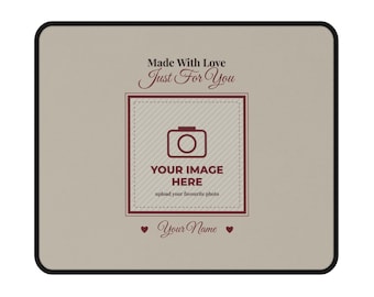 May include: A rectangular mouse pad with a beige surface and black border. The text reads Made With Love Just For You, with a central square frame containing a camera icon, the text YOUR IMAGE HERE, and upload your favourite photo. Below is Your Name.