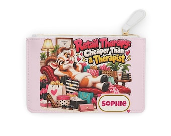 May include: A light pink rectangular zippered pouch featuring a cartoon goat lounging on a red sofa surrounded by shopping bags and the text Retail Therapy: Cheaper Than a Therapist. A white label on the bottom right displays the name SOPHIE.
