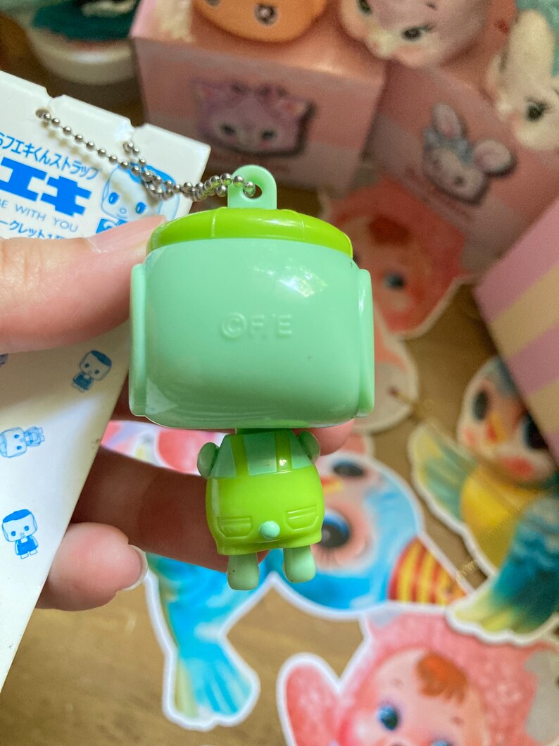 May include: A white ceramic mug with a black handle and the text "But First, Coffee" in a handwritten style. The mug is likely 11-15 ounces, suitable for hot beverages.