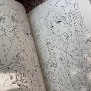 May include: A white ceramic mug with a black handle and the text "But First, Coffee" in a black, bold font. The mug is sitting on a wooden surface. The mug is approximately 4 inches tall.