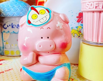 Cute vintage 1980s Pink Pig with Ultraman Mask kitschy ceramic figurine coin bank / piggy bank from Japan