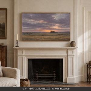 Könnte beinhalten: Ein rechteckiger Landschaftskunstdruck mit einem Sonnenuntergang über einem Feld mit goldenem Gras und bewölktem Himmel, in einem hellen Holzrahmen über einem weißen Kaminsims. Der Text lautet TV ART / DIGITAL DOWNLOAD / TV NOT INCLUDED.